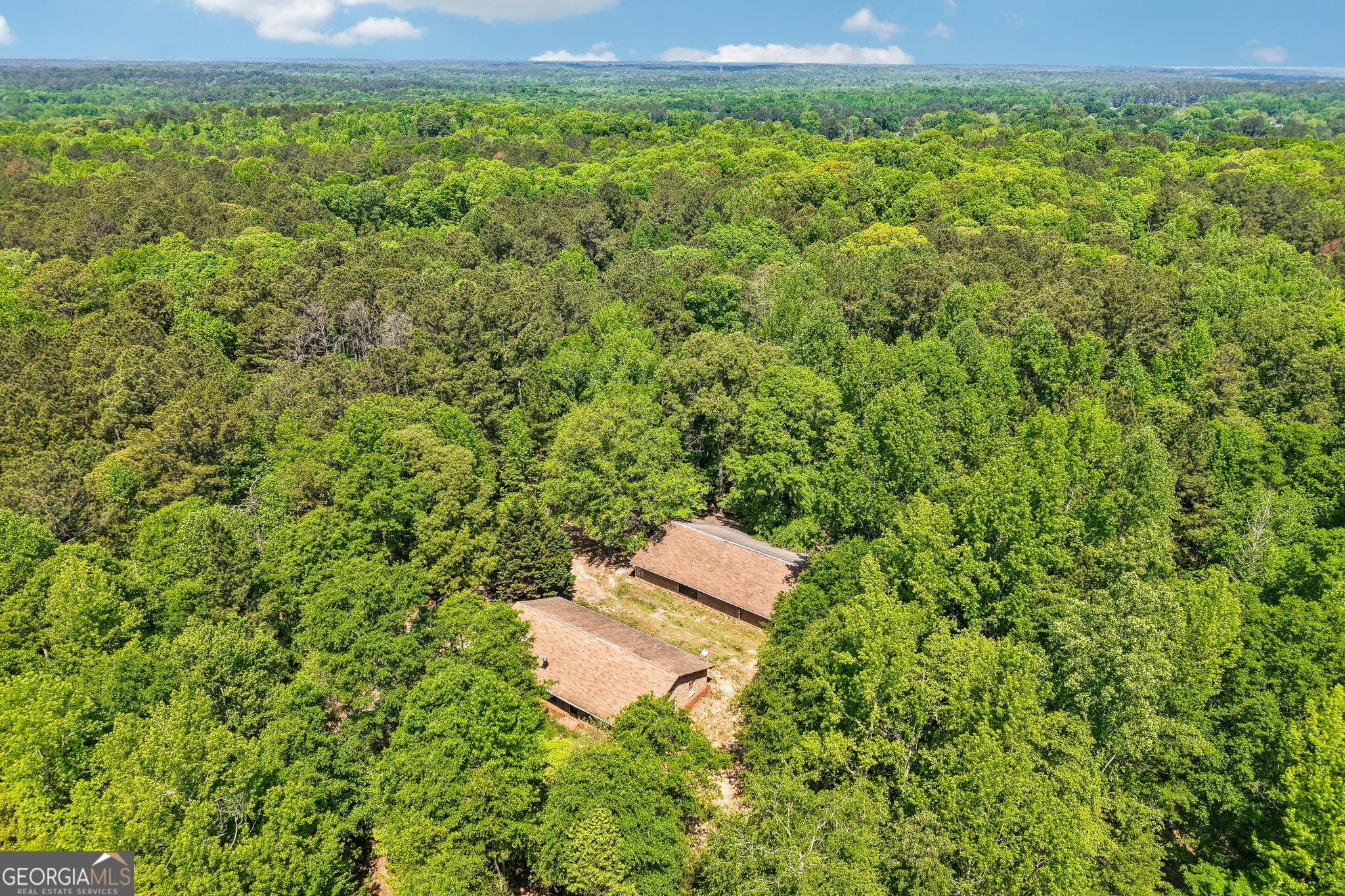 241 Busbin Road Fayetteville, GA 30215 - Photo 38 of 45 an aerial view of a house with a yard