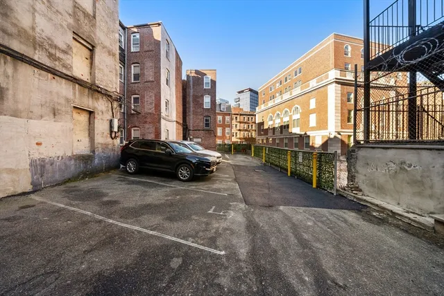 a view of a street with cars
