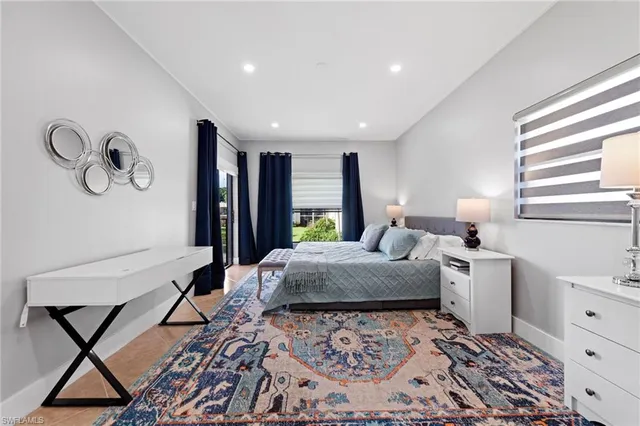 a kitchen with stainless steel appliances a refrigerator and a wooden cabinets