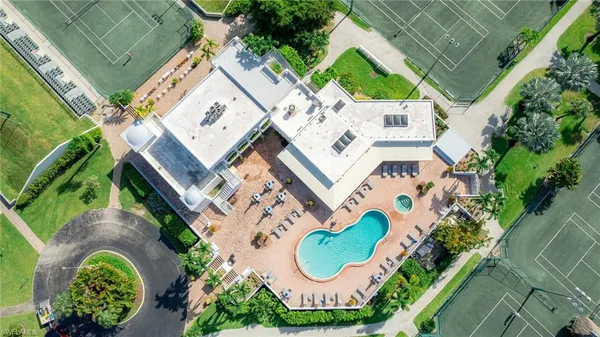 an aerial view of a house with a garden