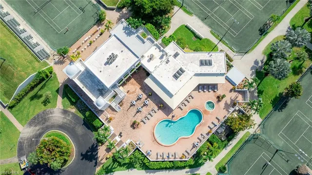 an aerial view of a house with a garden