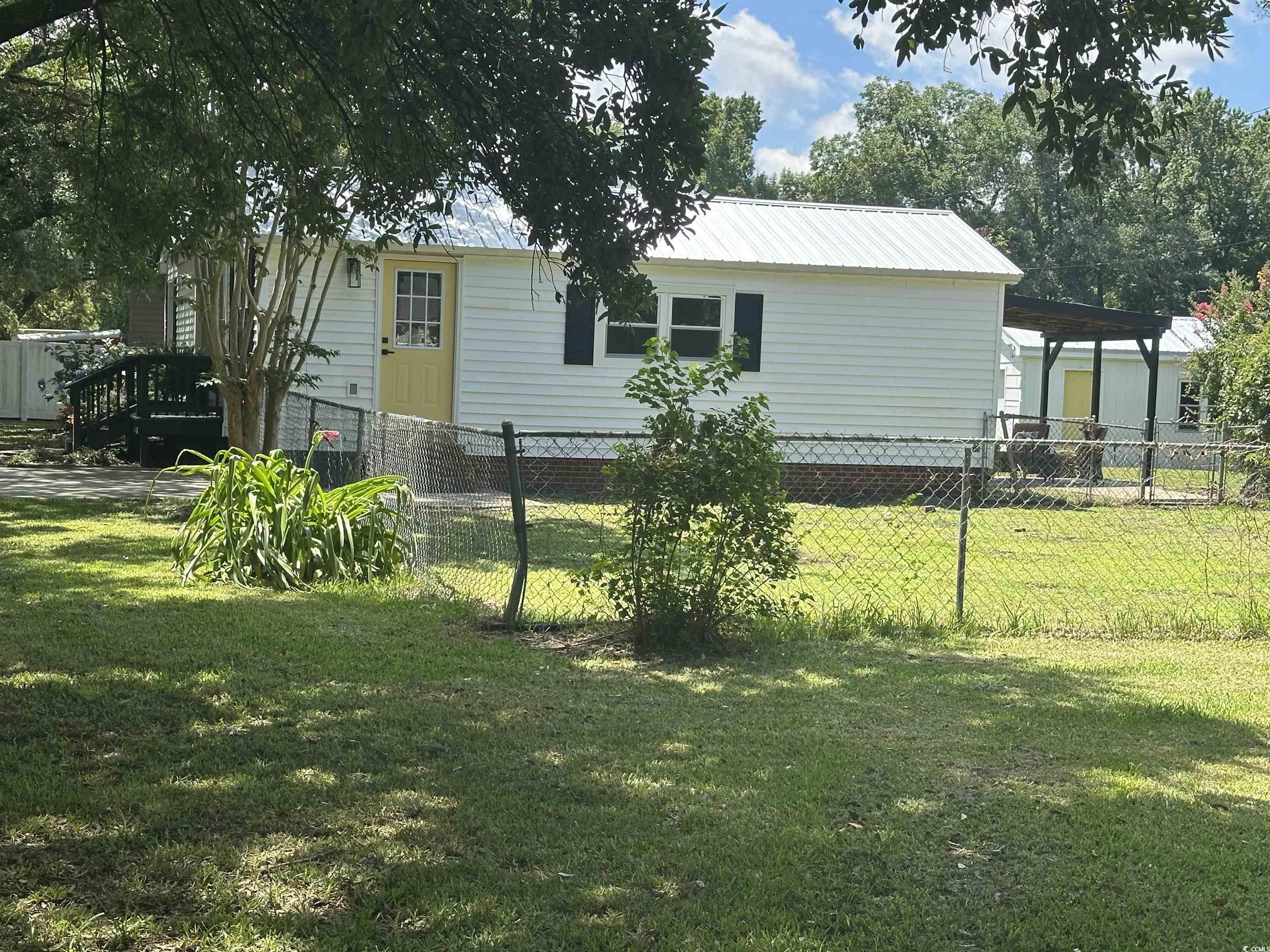 518 Nowell Street Georgetown, SC 29440 - Photo 13 of 28 shaded by large live oak trees