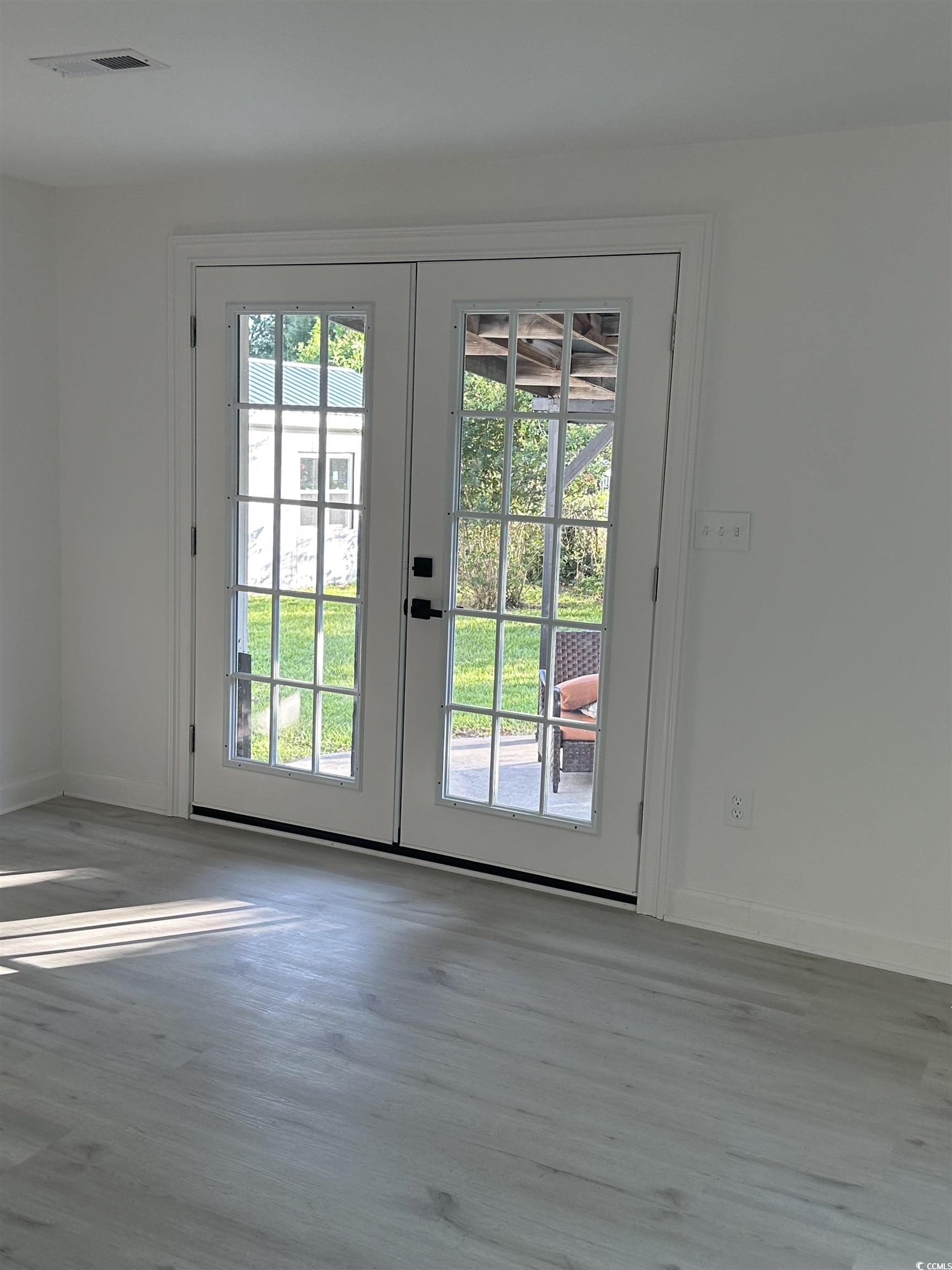 518 Nowell Street Georgetown, SC 29440 - Photo 21 of 28 Doorway featuring french doors, plenty of natural