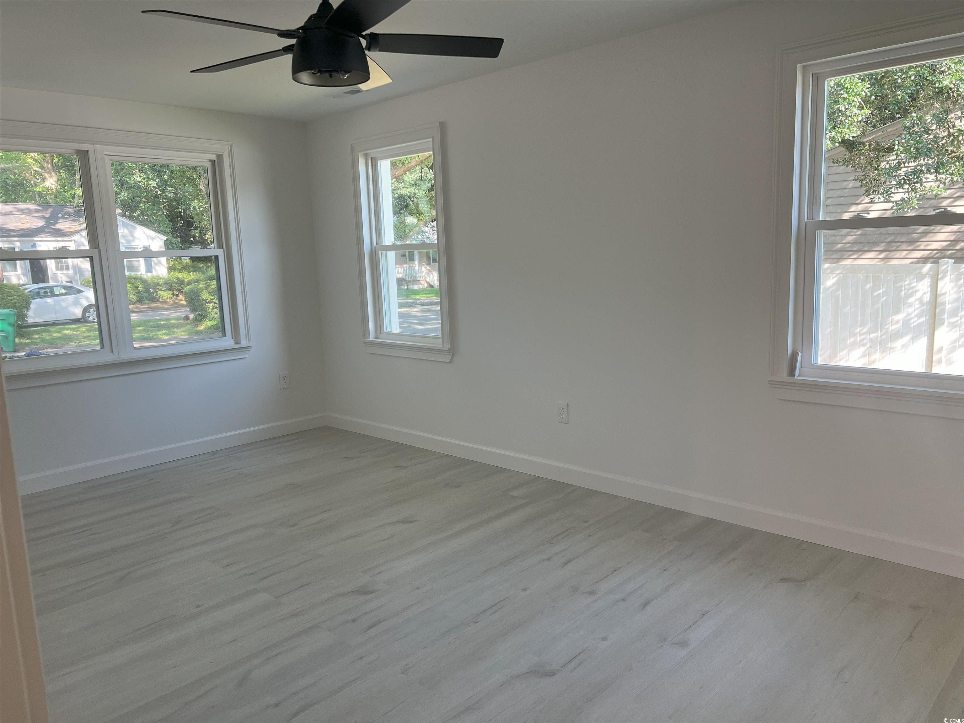 518 Nowell Street Georgetown, SC 29440 - Photo 22 of 28 Spare room featuring light wood finished floors an