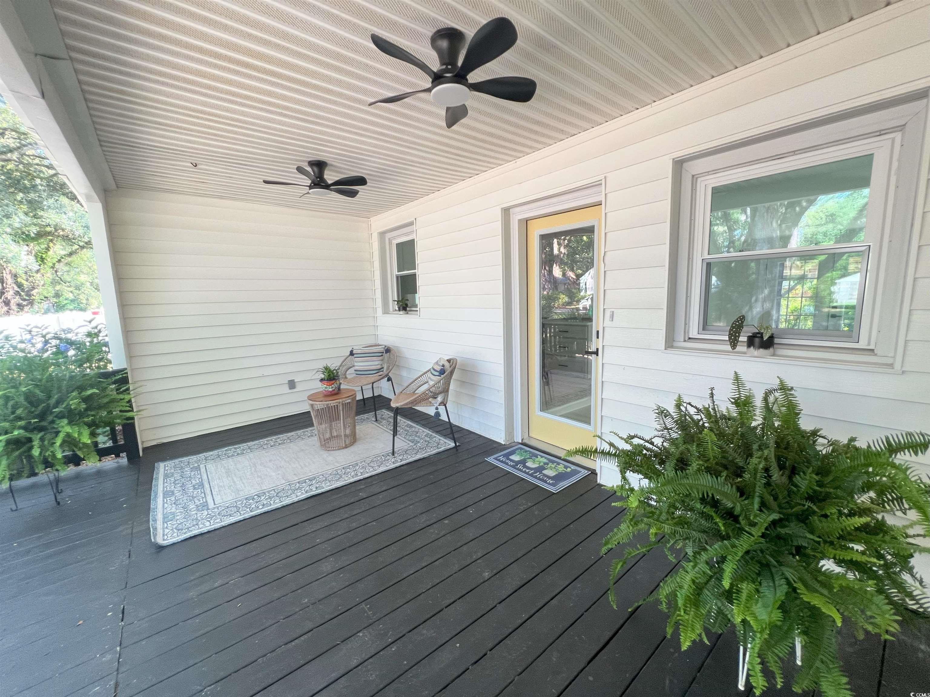 518 Nowell Street Georgetown, SC 29440 - Photo 5 of 28 Wooden terrace featuring a ceiling fan