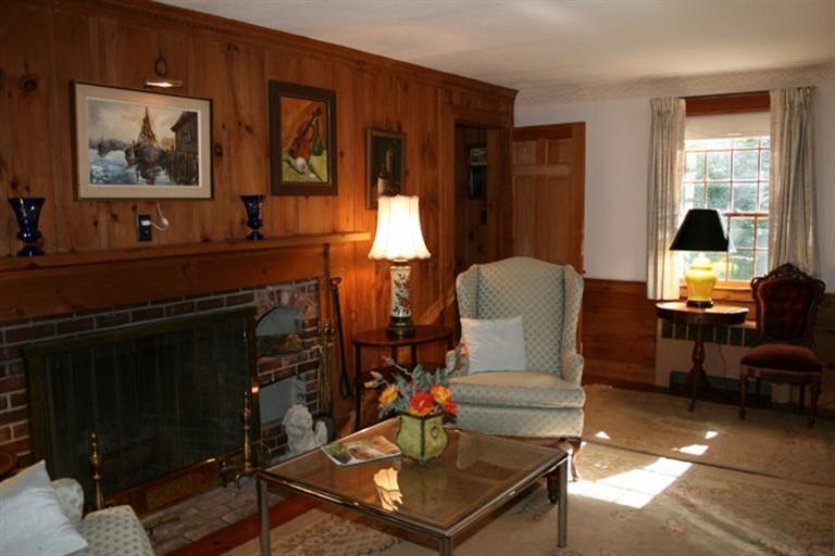 78 Brooks Road Harwich Port, MA 02646 - Photo 4 of 22 a living room with furniture a piano and a window