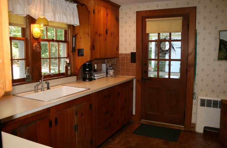 78 Brooks Road Harwich Port, MA 02646 - Photo 7 of 22 a bathroom with a double vanity sink and a mirror