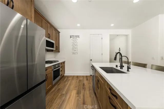 a view of a backyard with sitting area