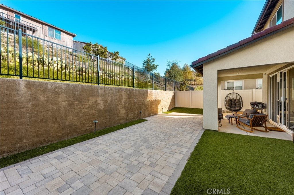 11786 Glenridge Road Corona, CA 92883 - Photo 24 of 73 a view of backyard with a patio and a garden