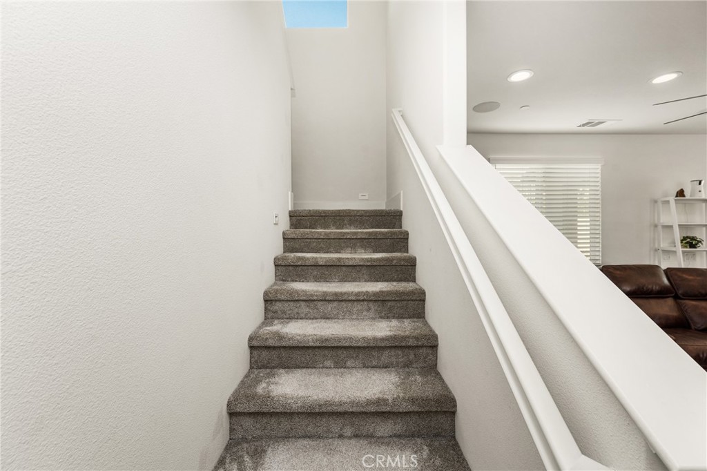 11786 Glenridge Road Corona, CA 92883 - Photo 29 of 73 Staircase leading to the upper level, connecting living and private spaces.