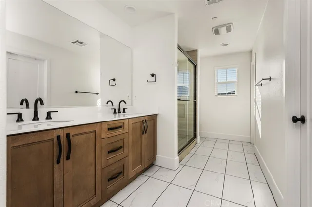 a bathroom with a toilet a sink and bathtub