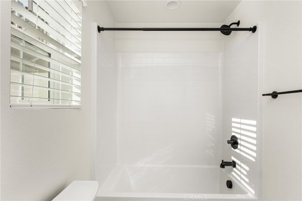 11786 Glenridge Road Corona, CA 92883 - Photo 43 of 73 a bathroom with a shower and a bathtub