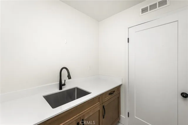 an aerial view of residential house with parking space