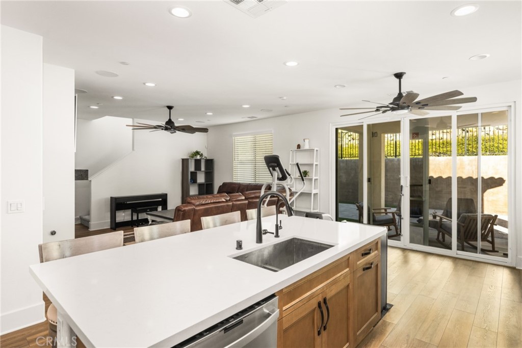 11786 Glenridge Road Corona, CA 92883 - Photo 6 of 73 a kitchen with stainless steel appliances a sink and stove
