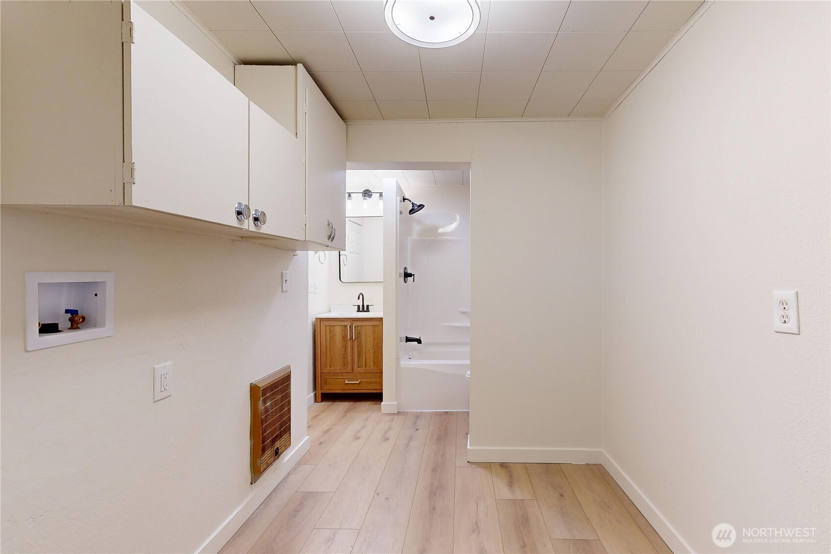 1209 Chestnut Street Milton Freewater, OR 97862 - Photo 16 of 23 a view of a kitchen with wooden floor