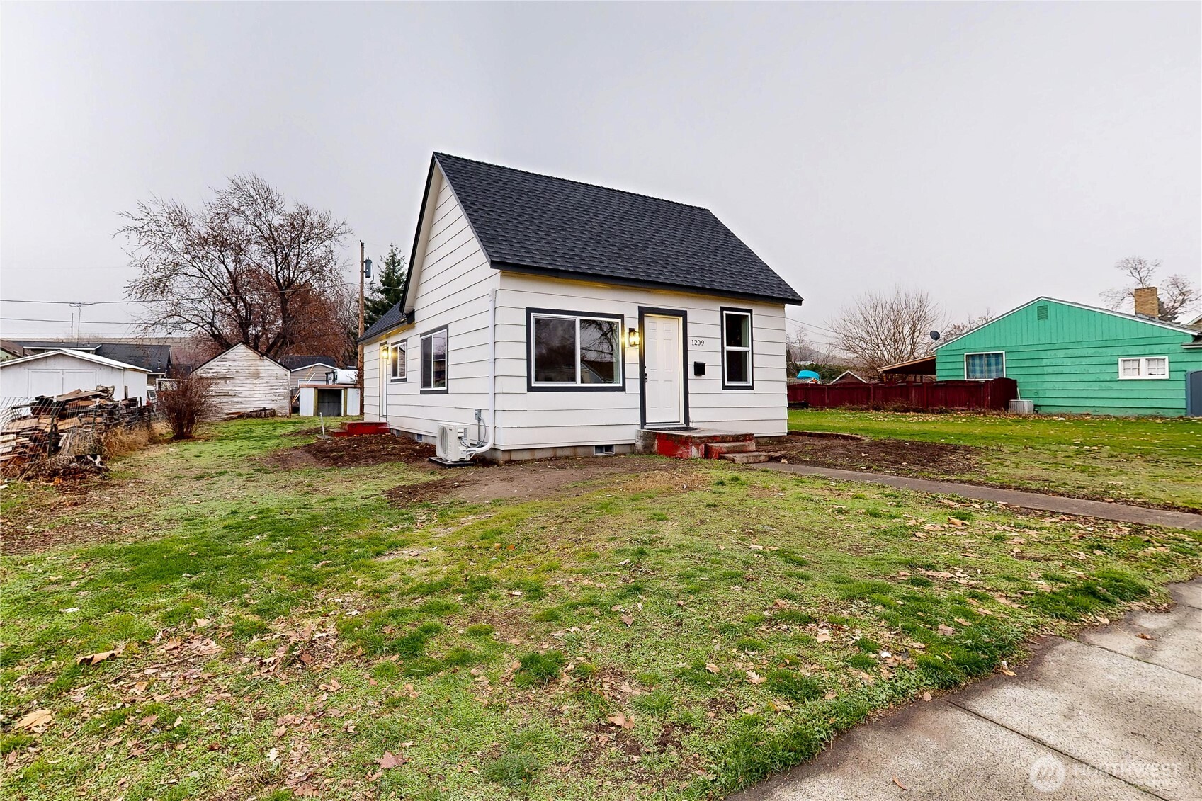 1209 Chestnut Street Milton Freewater, OR 97862 - Photo 19 of 23 a view of a house with a yard
