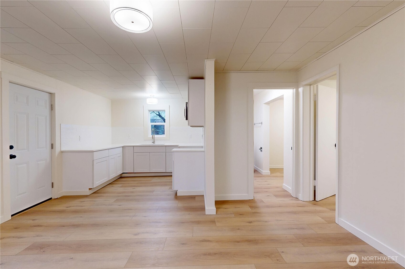 1209 Chestnut Street Milton Freewater, OR 97862 - Photo 6 of 23 a view of a kitchen with wooden floor