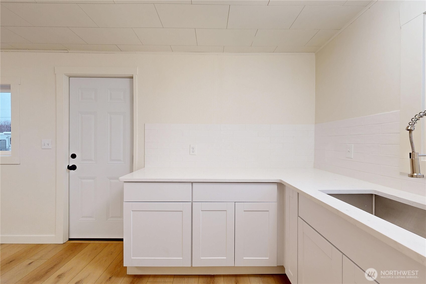 1209 Chestnut Street Milton Freewater, OR 97862 - Photo 9 of 23 a view of storage and utility room with wooden floor