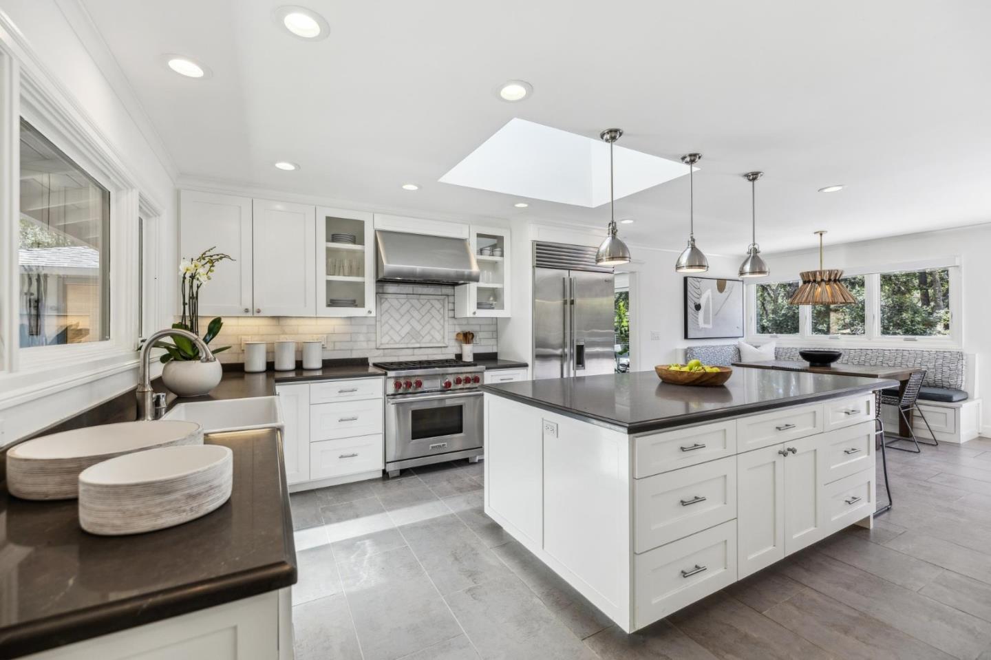 30 Cheyenne Point Portola Valley, CA 94028 - Photo 13 of 38 a kitchen with stainless steel appliances granite countertop a sink a stove and a wooden floors
