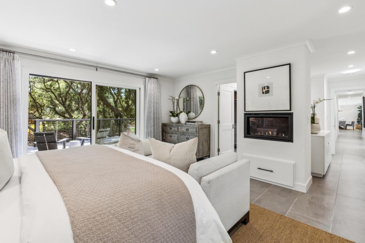 30 Cheyenne Point Portola Valley, CA 94028 - Photo 15 of 38 a living room with furniture a flat screen tv and a large window