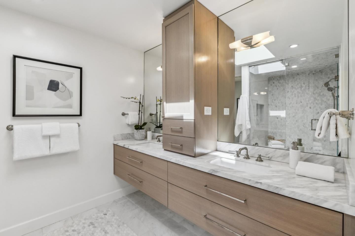 30 Cheyenne Point Portola Valley, CA 94028 - Photo 16 of 38 a bathroom with a double vanity sink and a mirror