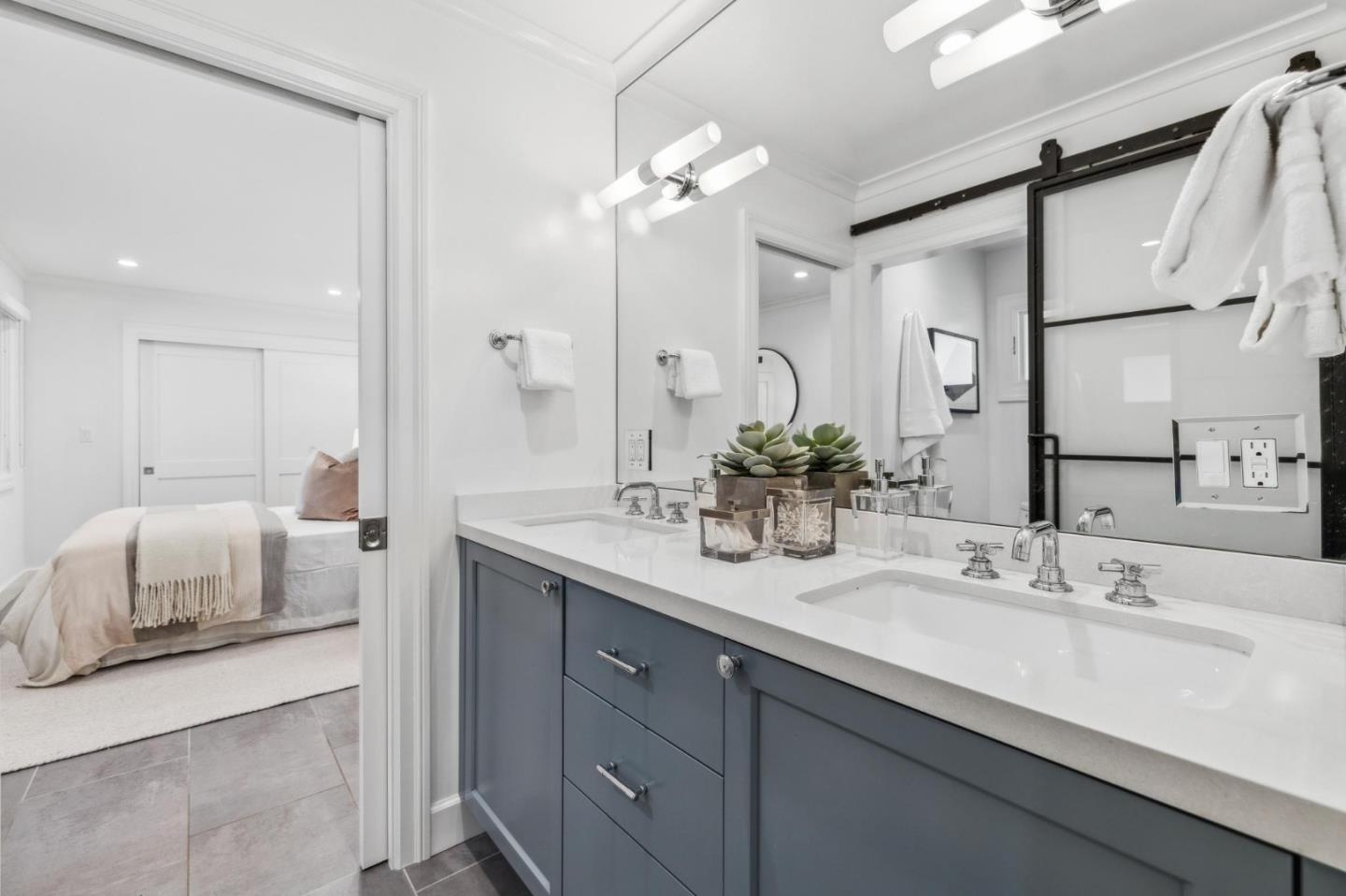 30 Cheyenne Point Portola Valley, CA 94028 - Photo 21 of 38 a bathroom with a double vanity sink and a mirror
