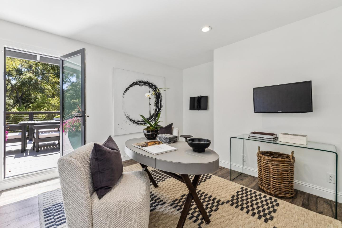 30 Cheyenne Point Portola Valley, CA 94028 - Photo 24 of 38 a living room with furniture a flat screen tv and a floor to ceiling window