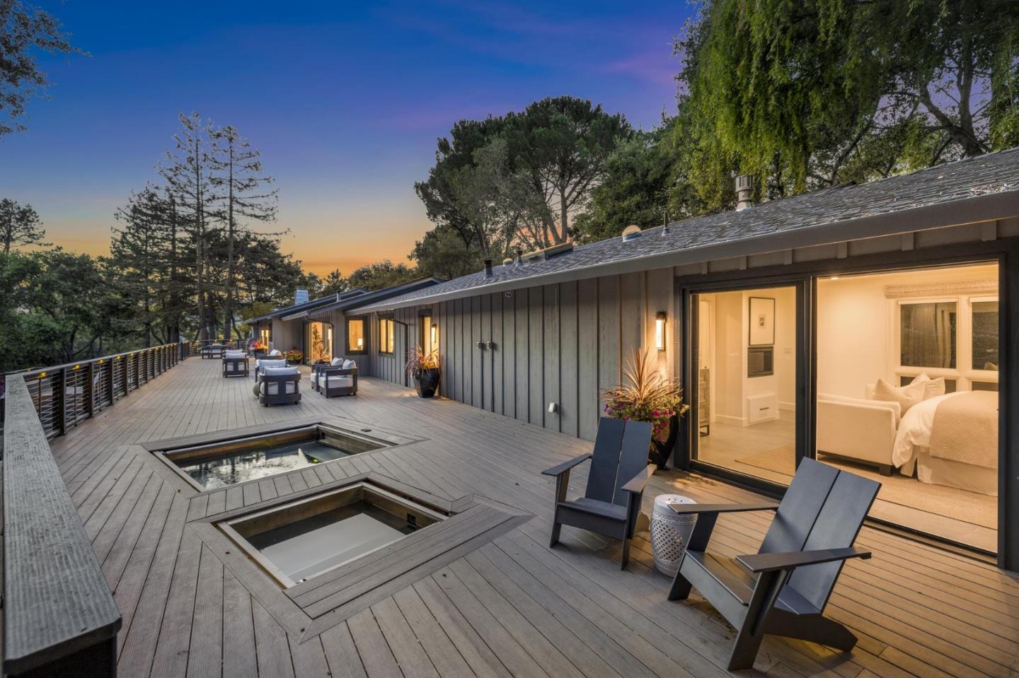 30 Cheyenne Point Portola Valley, CA 94028 - Photo 27 of 38 a view of a patio with table and chairs with wooden floor and fence