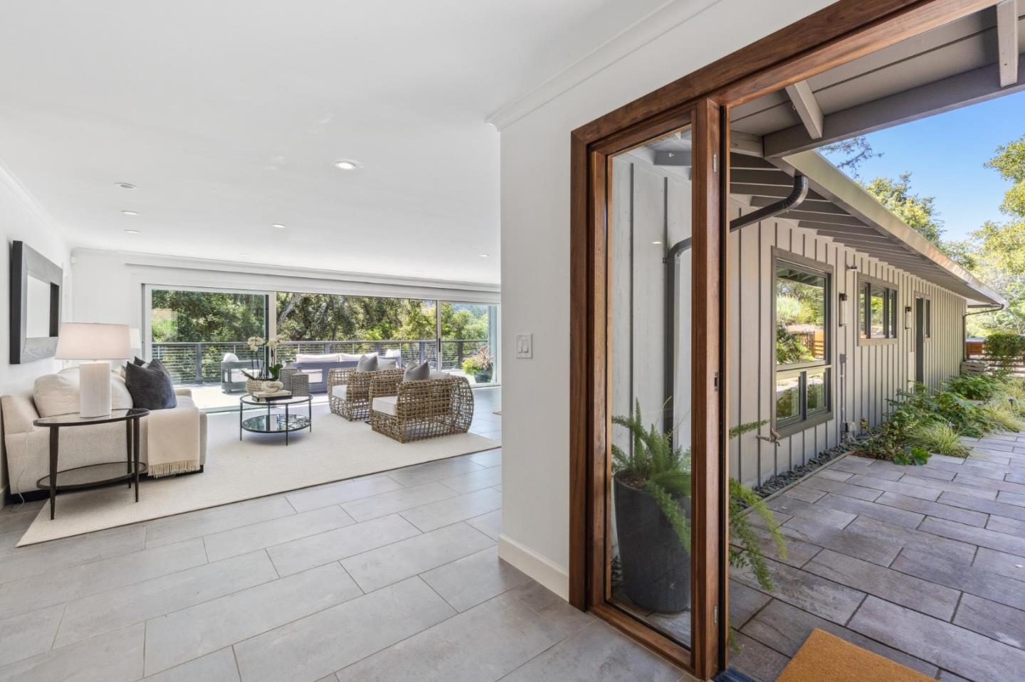 30 Cheyenne Point Portola Valley, CA 94028 - Photo 5 of 38 a outdoor space with patio couch and glass windows