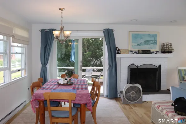 a view of a dining room with furniture window and outside view
