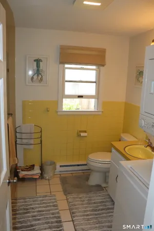 a bathroom with a sink and a toilet