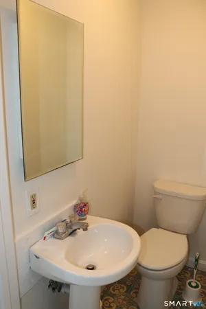 a bathroom with a sink and a toilet