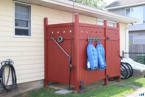 a view of front door and small yard