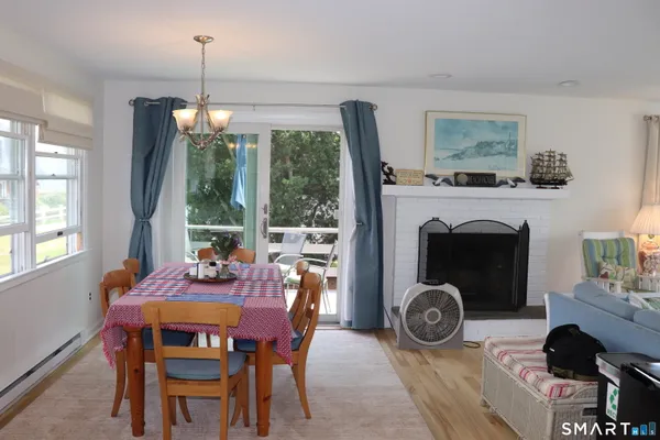 a view of a dining room with furniture window and outside view