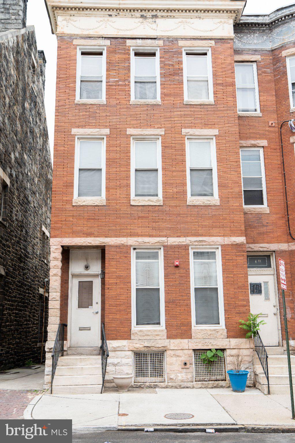 Charming brick facade with urban flair.
