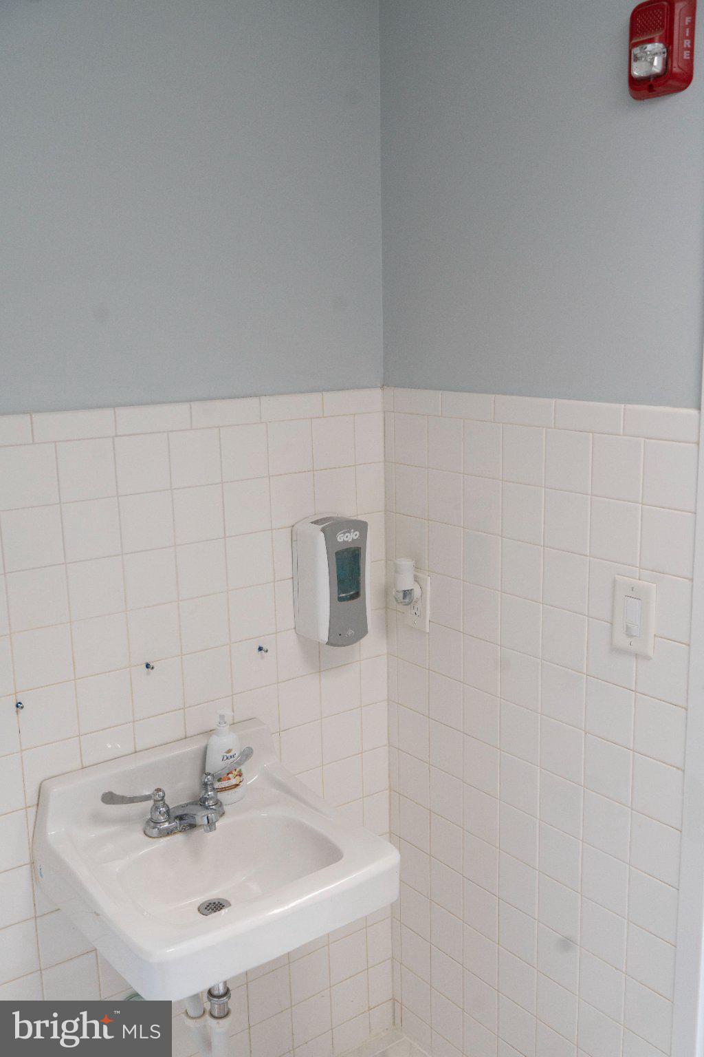 8 North Pulaski Street Baltimore, MD 21223 - Photo 15 of 25 Modern restroom with sleek design.