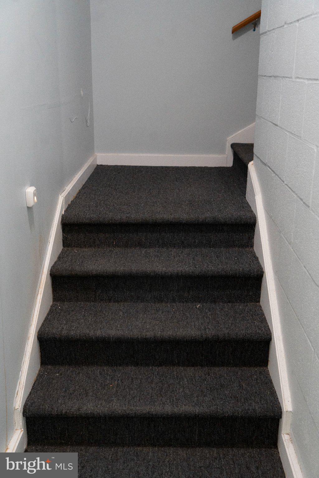 8 North Pulaski Street Baltimore, MD 21223 - Photo 18 of 25 Inviting staircase to upper levels.