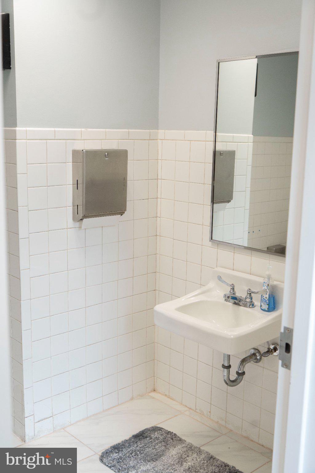 8 North Pulaski Street Baltimore, MD 21223 - Photo 20 of 25 Modern restroom with sleek design.