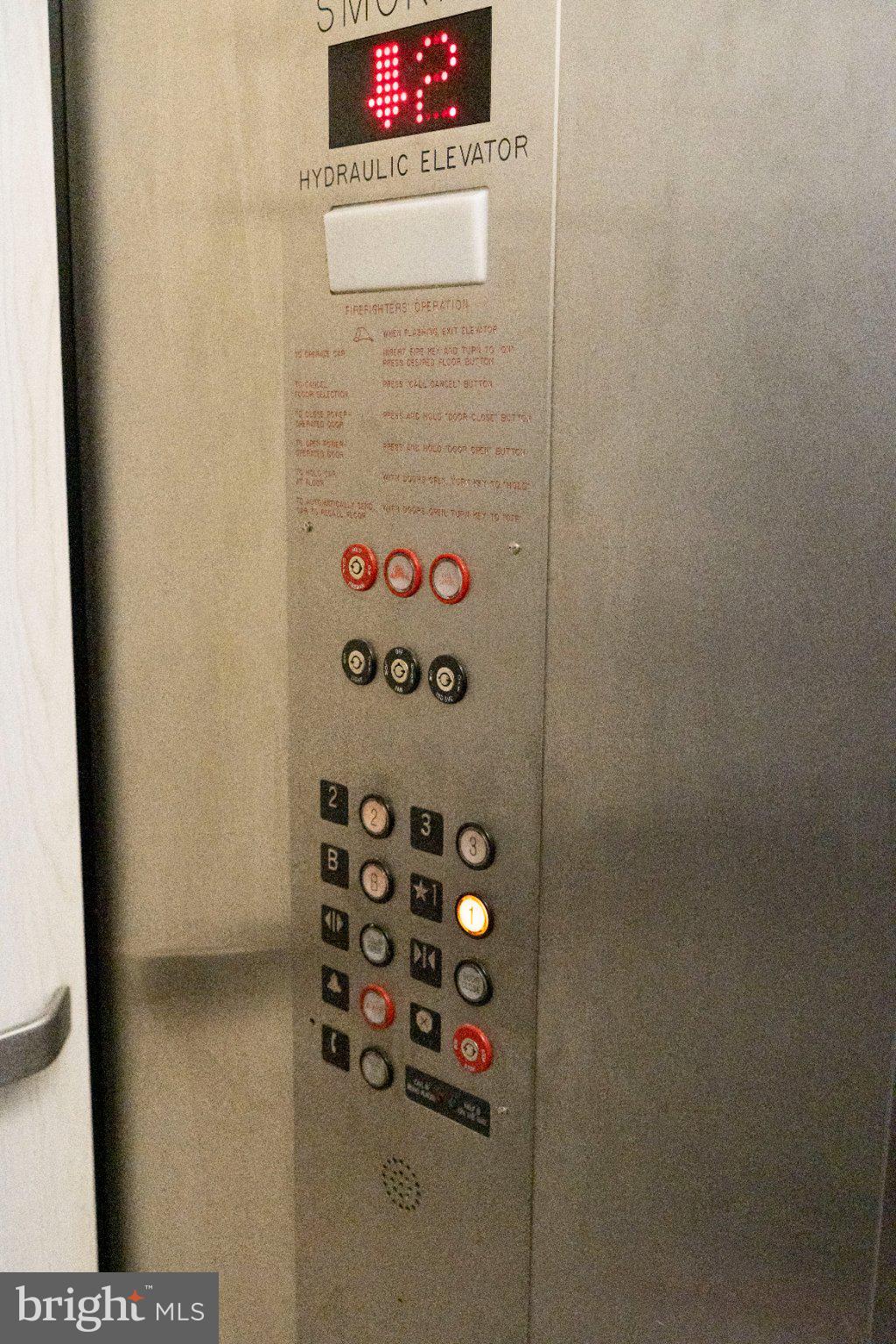 8 North Pulaski Street Baltimore, MD 21223 - Photo 22 of 25 Modern hydraulic elevator control panel.