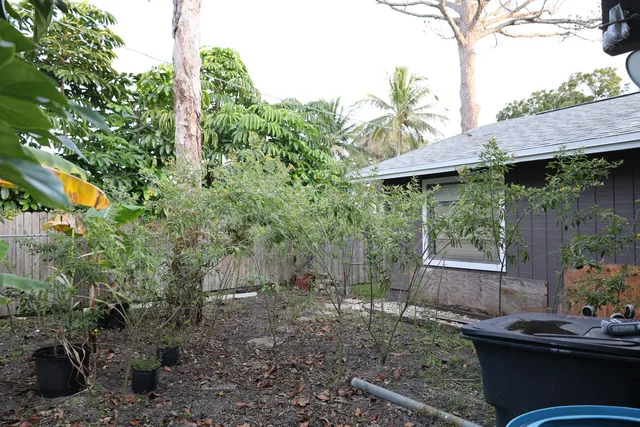 a backyard of a house with seating space