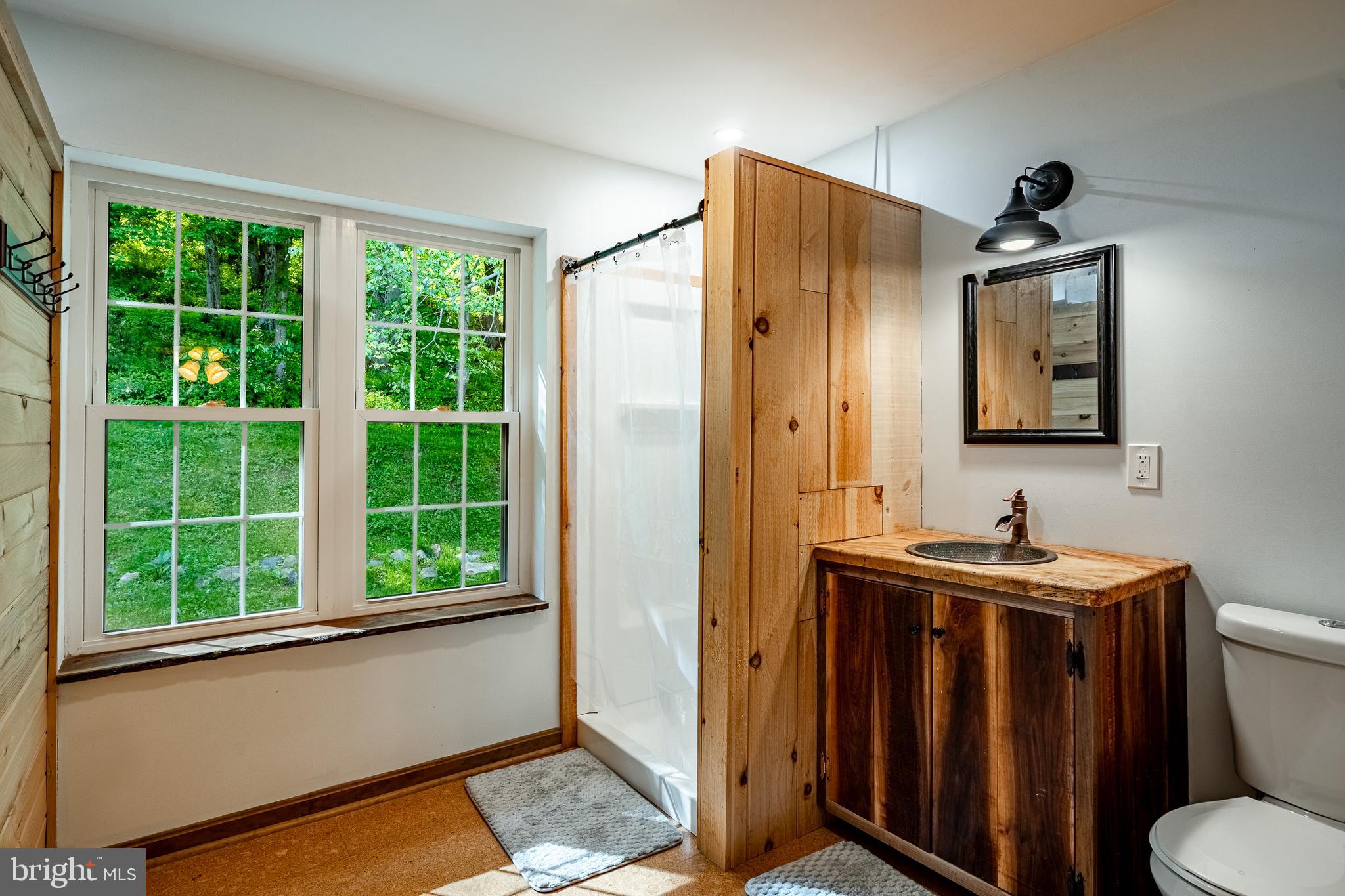 186 Bragg Hill Road West Chester, PA 19382 - Photo 48 of 73 a bathroom with a sink toilet and mirror