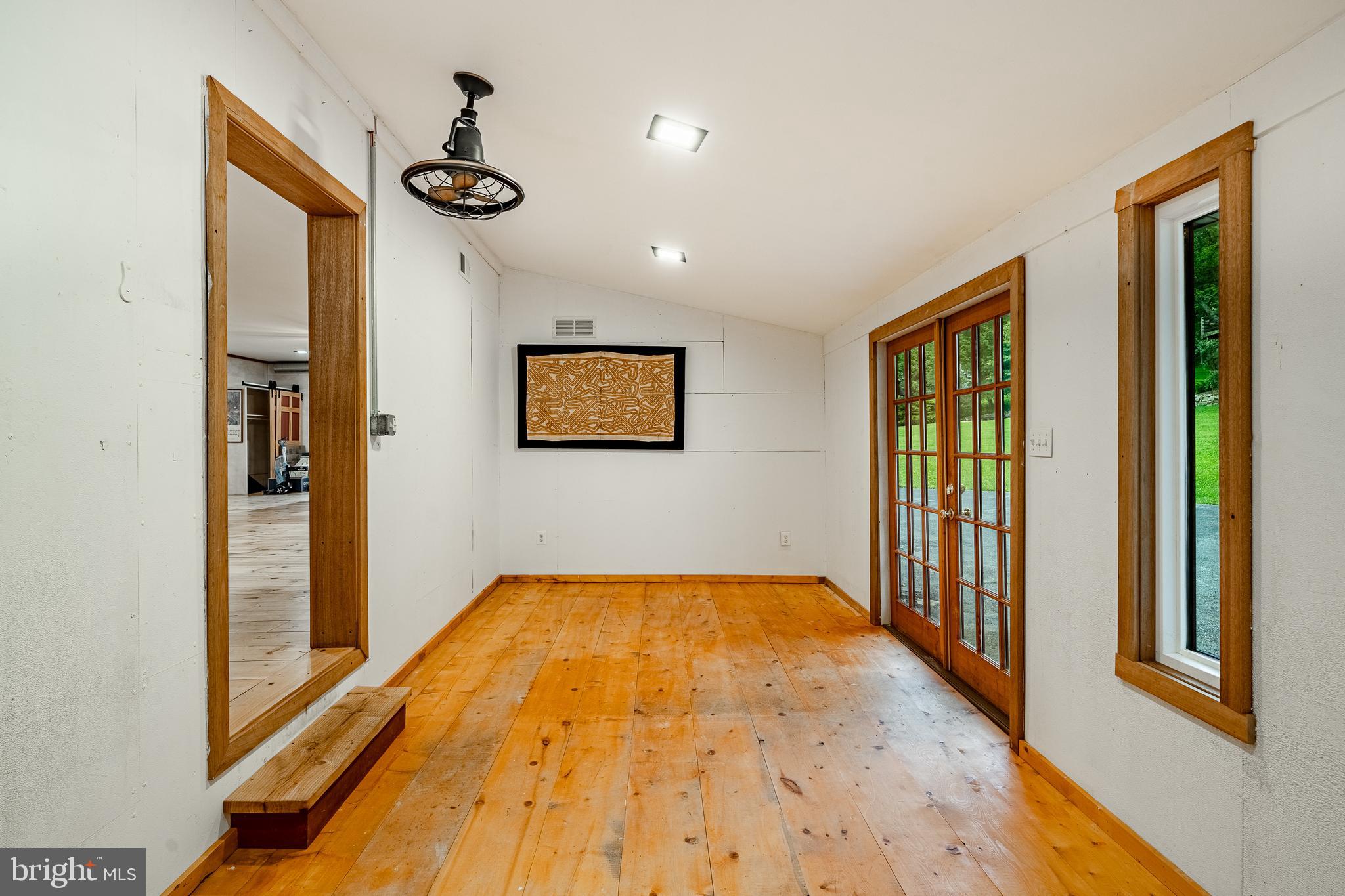 186 Bragg Hill Road West Chester, PA 19382 - Photo 56 of 73 a view of hallway with a front door and wooden floor
