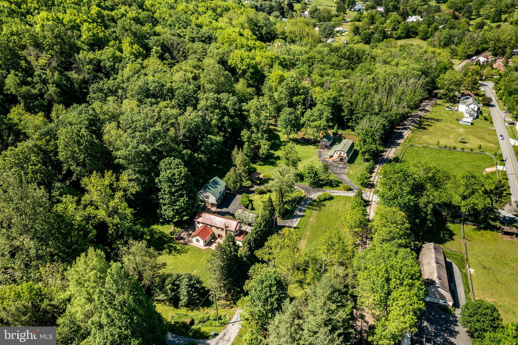 186 Bragg Hill Road West Chester, PA 19382 - Photo 69 of 73 an aerial view of residential house with outdoor space and trees all around