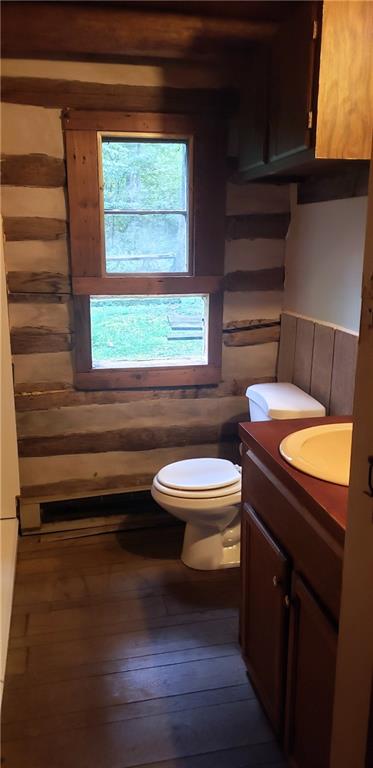 328 Wilkins Road Rector, PA 15677 - Photo 13 of 19 a bathroom with a granite countertop toilet sink and mirror