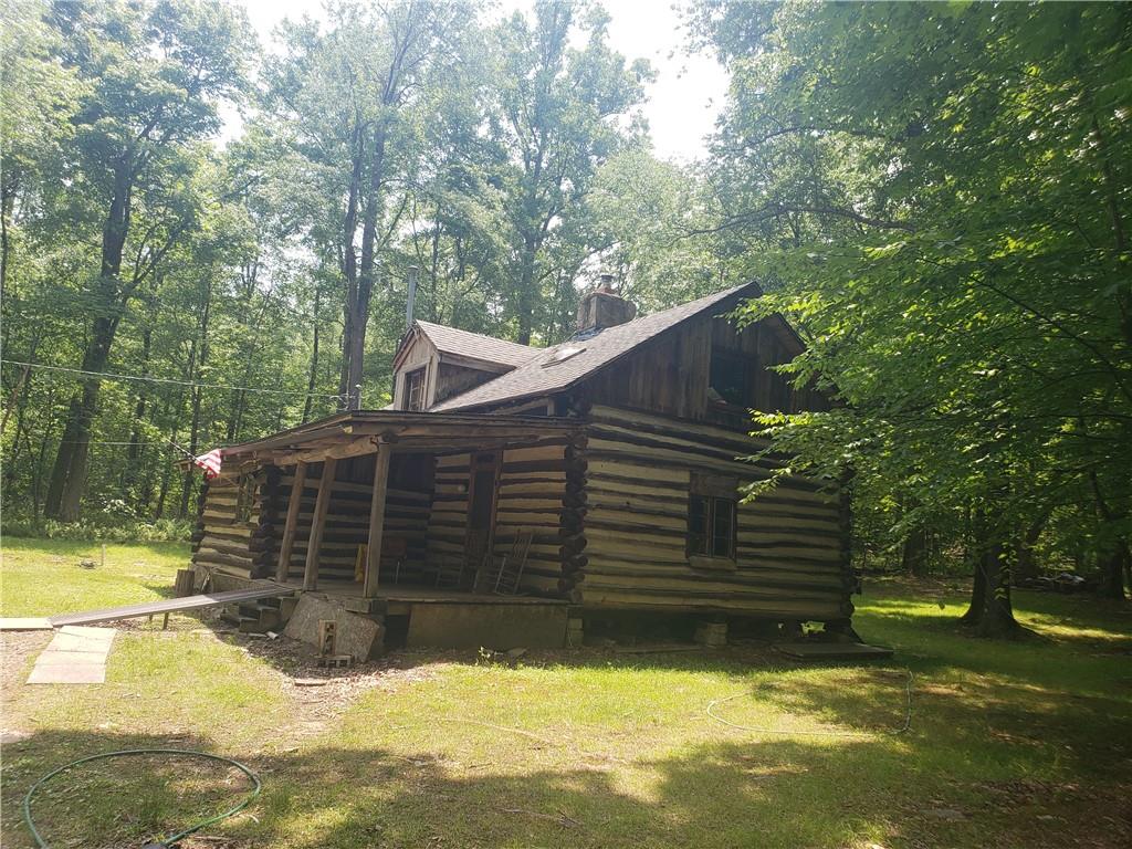 328 Wilkins Road Rector, PA 15677 - Photo 7 of 19 a view of a house with a yard