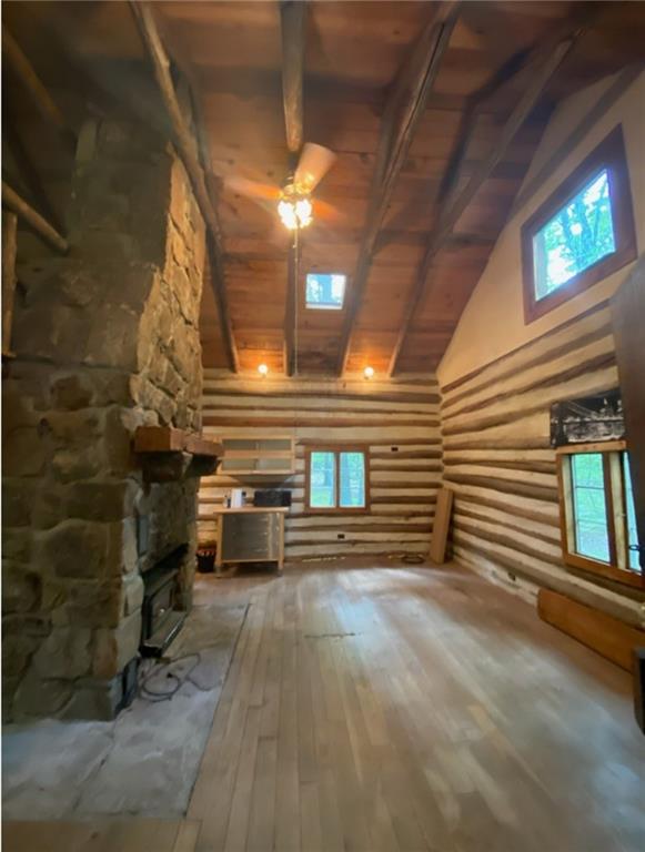 328 Wilkins Road Rector, PA 15677 - Photo 8 of 19 a view of a porch with furniture and a fireplace