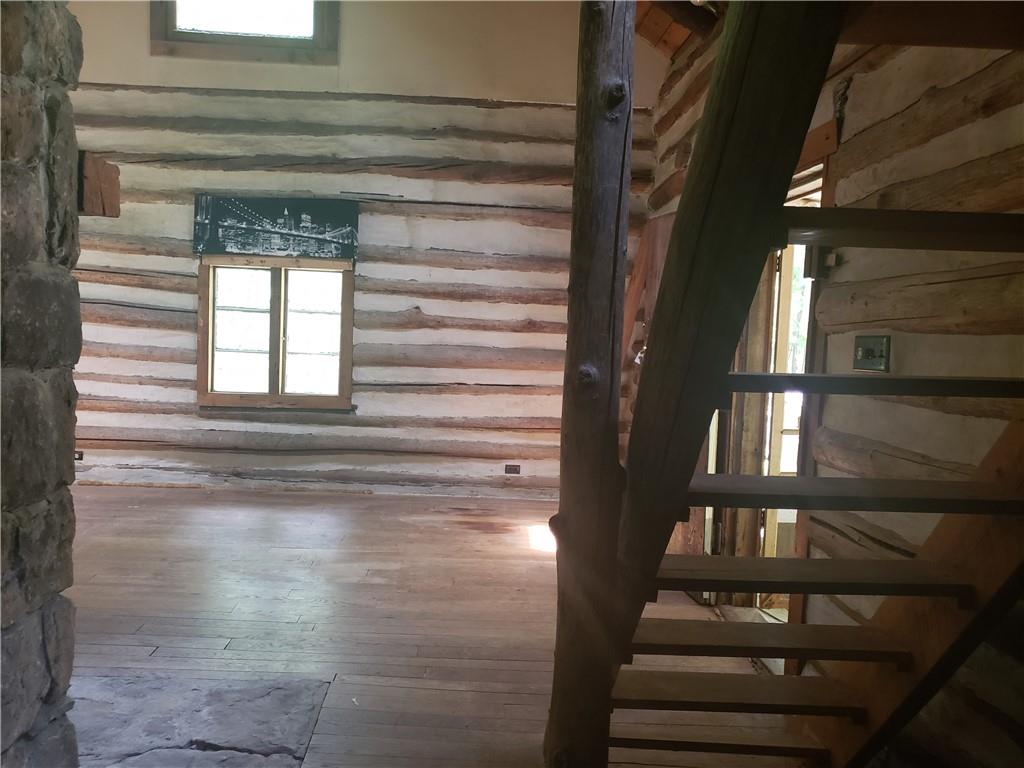 328 Wilkins Road Rector, PA 15677 - Photo 9 of 19 a view of staircase with white walls and windows