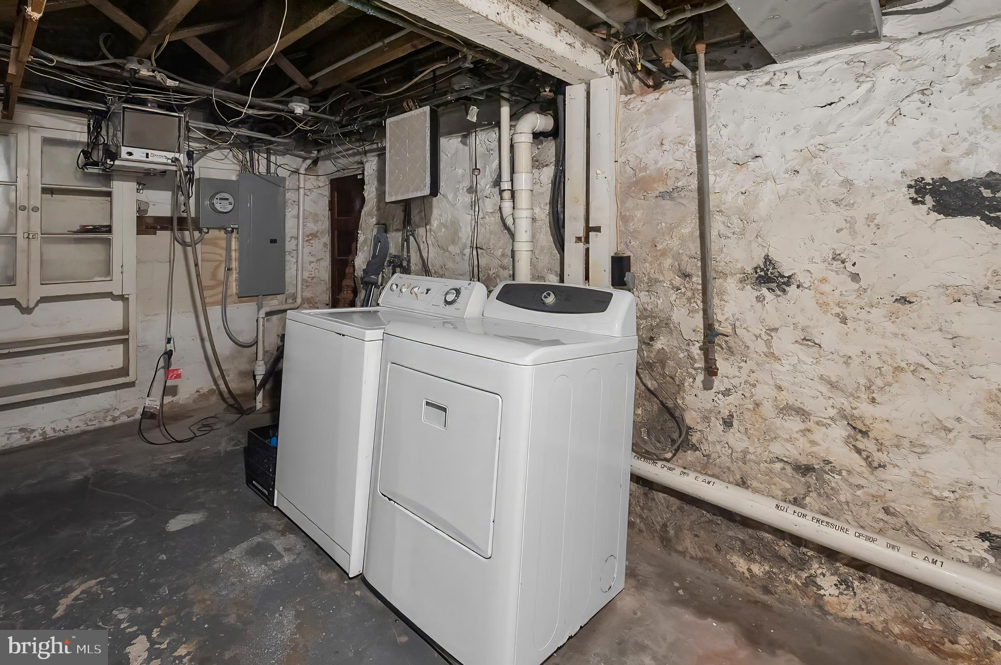 3105 Mareco Avenue Baltimore, MD 21213 - Photo 22 of 27 a utility room with dryer and washer