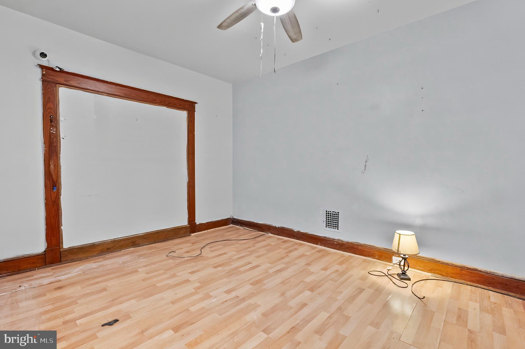 3105 Mareco Avenue Baltimore, MD 21213 - Photo 6 of 27 a view of an empty room with a chandelier fan