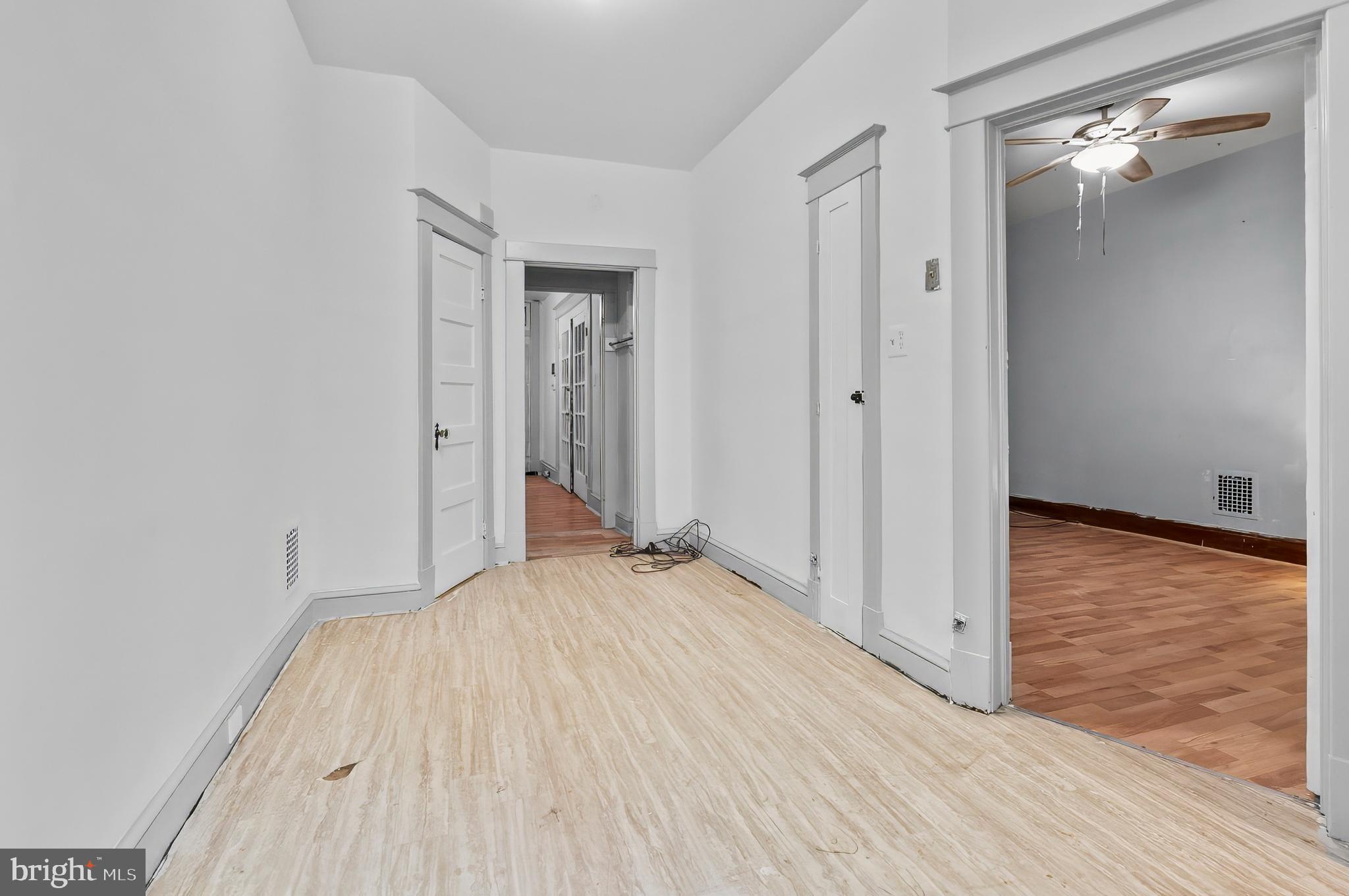 3105 Mareco Avenue Baltimore, MD 21213 - Photo 10 of 27 a view of empty room with wooden floor